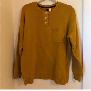 Cute mustard sweater.